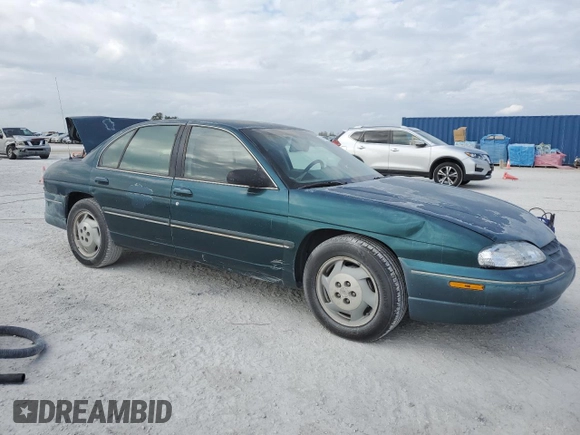 1997 Chevrolet Lumina LS with VIN 2G1WL52M1V9120300, listed as a Copart auction lot 87460394 with 142,588 mi miles and Salvage Title. Bid and sale history available at DreamBid. Image 4.