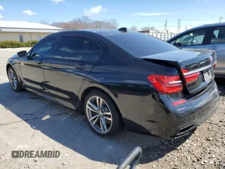 2017 BMW 7 Series 740e xDrive iPerformance with VIN WBA7J2C33HG497980, listed as a Copart auction lot 50244384 with 115,728 mi miles. Bid and sale history available at carsss.com. Image 2.