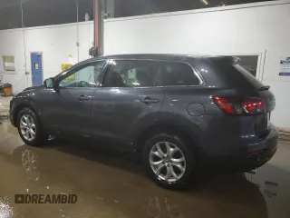 2015 Mazda CX-9 Sport with VIN JM3TB3BA0F0457583, listed as a Copart auction lot 54334135 with 144,767 mi miles and Salvage Title. Bid and sale history available at carsss.com. Image 2.