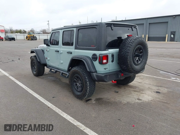2023 Jeep Wrangler Rubicon with VIN 1C4JJXFG7PW654564, listed as a IAAI auction lot 41833534 with 22,277 mi miles and . Bid and sale history available at DreamBid. Image 3.