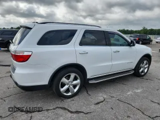 2013 Dodge Durango Citadel with VIN 1C4RDHEG6DC658958, listed as a Copart auction lot 60304945 with 209,250 mi miles and Salvage title. Bid and sale history available at DreamBid. Image 3.