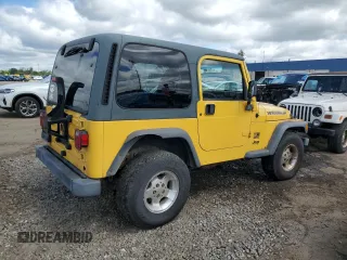 2001 Jeep Wrangler Sport z VIN 1J4FA49S01P355451, wystawiony jako Copart lot #56501545 z przebiegiem 213 027 mil mil oraz Czysty tytuł • Clean title. Historia ofert i sprzedaży dostępna na DreamBid. Obrazek 3.