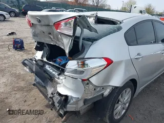 2014 Kia Forte LX with VIN KNAFX4A61E5081257, listed as a IAAI auction lot 42011042 with Not Provided miles and . Bid and sale history available at carsss.com. Image 12.