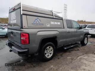 2017 GMC Sierra 1500 SLE z VIN 1GTV2MEC5HZ177175, wystawiony jako Copart lot #53640195 z przebiegiem 100 252 mil mil oraz Szkoda całkowita • Salvage title. Historia ofert i sprzedaży dostępna na DreamBid. Obrazek 3.