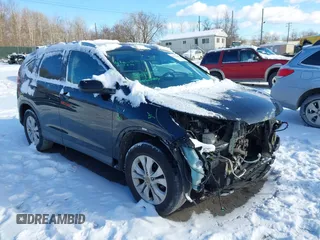 2014 Honda CR-V EX-L with VIN 2HKRM4H76EH659957, listed as a IAAI auction lot 41310681 with 256,784 mi miles. Bid and sale history available at carsss.com. Image 1.