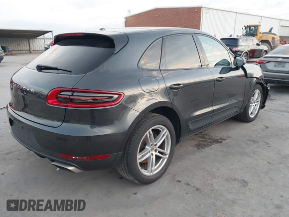 2018 Porsche Macan with VIN WP1AA2A53JLB05430, listed as a IAAI auction lot 41575202 with 65,834 mi miles. Bid and sale history available at carsss.com. Image 4.