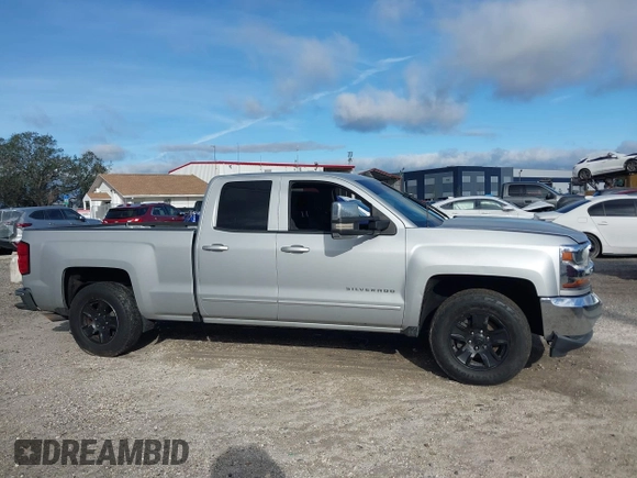 2018 Chevrolet Silverado 1500 LT with VIN 1GCRCREC5JZ138622, listed as a IAAI auction lot 41631828 with Not Provided miles and . Bid and sale history available at DreamBid. Image 13.