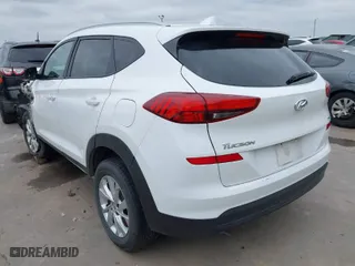 2019 Hyundai Tucson Value with VIN KM8J3CA42KU874050, listed as a IAAI auction lot 41516201 with 146,795 mi miles. Bid and sale history available at carsss.com. Image 3.