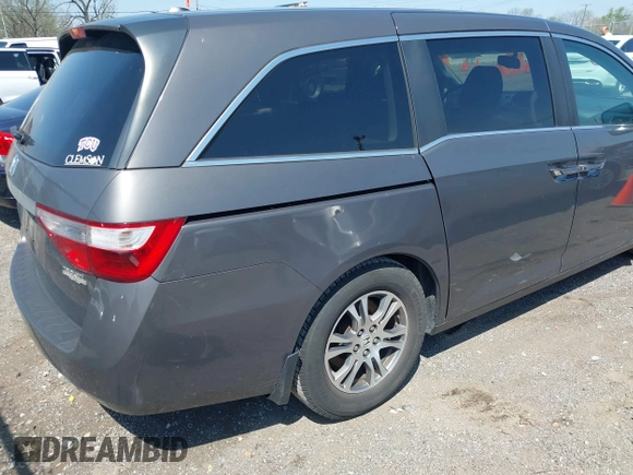 2013 Honda Odyssey EX-L with VIN 5FNRL5H65DB011071, listed as a IAAI auction lot 41992265 with 192,624 mi miles and . Bid and sale history available at DreamBid. Image 4.