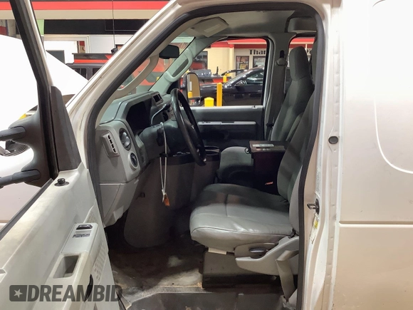 2013 Ford Econoline Cargo Commercial with VIN 1FTNE1EW9DDA61968, listed as a IAAI auction lot 42643038 with 121,719 mi miles and . Bid and sale history available at DreamBid. Image 15.