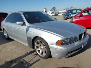 2003 BMW 5 Series 525iA with VIN WBADT43463G025654, listed as a IAAI auction lot 42152553 with 189,396 mi miles. Bid and sale history available at carsss.com. Image 1.
