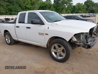 2014 Ram 1500 Express with VIN 1C6RR6FT9ES101025, listed as a IAAI auction lot 42265700 with 161,580 mi miles and . Bid and sale history available at DreamBid. Image 1.