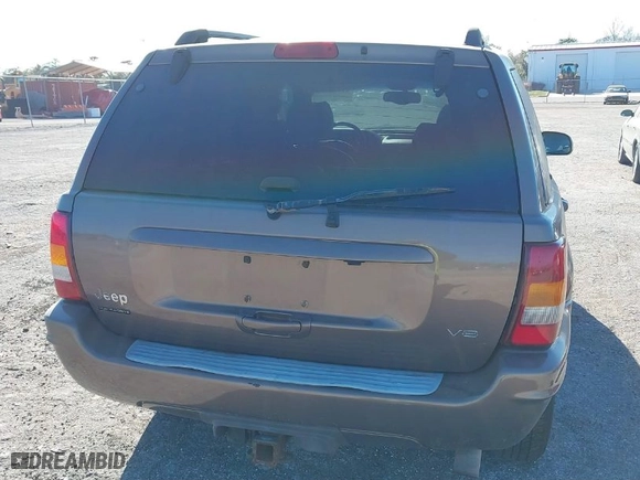 2002 Jeep Grand Cherokee Limited with VIN 1J8GW58N12C268589, listed as a IAAI auction lot 41748099 with 146,673 mi miles. Bid and sale history available at carsss.com. Image 6.