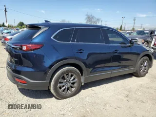 2022 Mazda CX-9 Touring z VIN JM3TCBCY5N0627731, wystawiony jako Copart lot #52804985 z przebiegiem 24 425 mil mil oraz Szkoda całkowita • Salvage title. Historia ofert i sprzedaży dostępna na DreamBid. Obrazek 3.