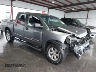 2014 Nissan Titan S with VIN 1N6AA0ECXEN504034, listed as a IAAI auction lot 39883492 with 189,529 mi miles. Bid and sale history available at carsss.com. Image 1.