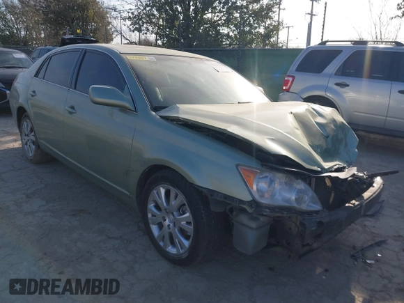 2010 Toyota Avalon XL with VIN 4T1BK3DB9AU354427, listed as a IAAI auction lot 41614018 with Not Provided miles and . Bid and sale history available at carsss.com. Image 1.