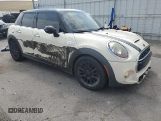 2016 MINI Hardtop 4 Door S with VIN WMWXU3C57G2B63075, listed as a Copart auction lot 63998995 with 71,008 mi miles and Salvage title. Bid and sale history available at DreamBid. Image 4.