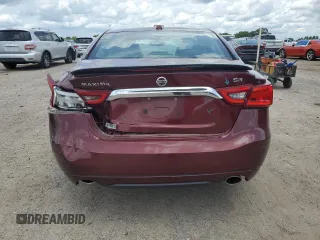 2016 Nissan Maxima SR with VIN 1N4AA6AP5GC404071, listed as a Copart auction lot 60612015 with 34,917 mi miles and Salvage title. Bid and sale history available at DreamBid. Image 6.