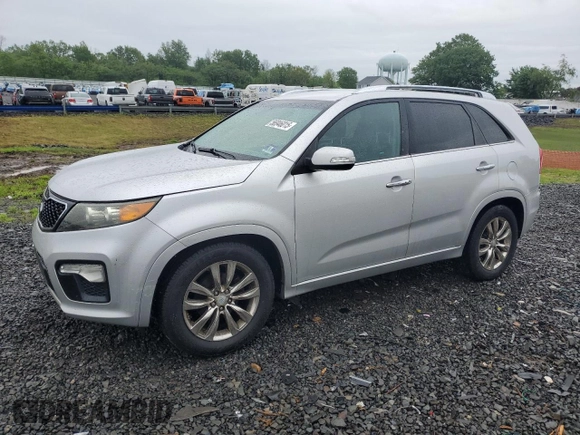 2011 Kia Sorento SX with VIN 5XYKW4A2XBG099857, listed as a Copart auction lot 56946015 with 195,457 mi miles and Salvage title. Bid and sale history available at DreamBid. Image 1.