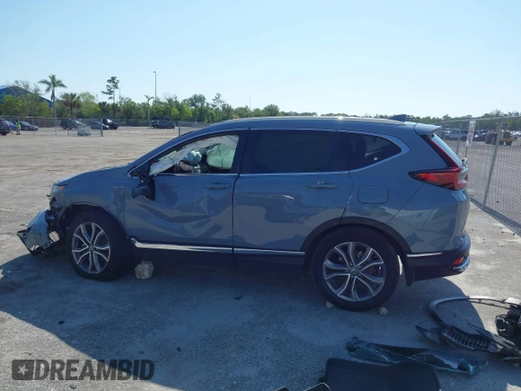 2022 Honda CR-V Touring z VIN 5J6RT6H91NL014087, wystawiony jako IAAI lot #42274863 z przebiegiem 53 478 mil mil oraz . Historia ofert i sprzedaży dostępna na DreamBid. Obrazek 14.