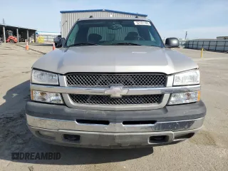 2005 Chevrolet Silverado 1500 LS z VIN 1GCEK19T55E193176, wystawiony jako Copart lot #52181185 z przebiegiem 418 180 mil mil oraz Czysty tytuł • Clean title. Historia ofert i sprzedaży dostępna na DreamBid. Obrazek 5.