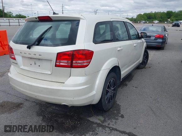 2014 Dodge Journey SE with VIN 3C4PDCAB1ET192530, listed as a IAAI auction lot 41987728 with 186,486 mi miles and . Bid and sale history available at carsss.com. Image 4.