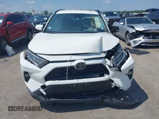 2021 Toyota RAV4 XLE with VIN JTMW1RFV2MD063839, listed as a IAAI auction lot 42406891 with 69,490 mi miles and . Bid and sale history available at DreamBid. Image 12.