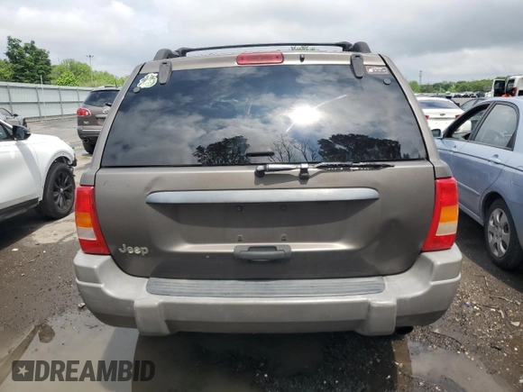 2000 Jeep Grand Cherokee Laredo с VIN 1J4G248S4YC299003, выставлен на аукционе Copart как лот 55937685 с пробегом Не указан миль и Списание • Salvage title. История ставок и продаж доступна на DreamBid. Изображение 6.