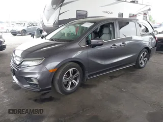 2019 Honda Odyssey Touring z VIN 5FNRL6H88KB037149, wystawiony jako IAAI lot #42356871 z przebiegiem 64 549 mil mil oraz . Historia ofert i sprzedaży dostępna na DreamBid. Obrazek 17.