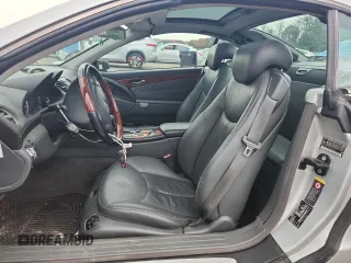 2005 Mercedes-Benz SL 500 with VIN WDBSK75F65F093215, listed as a Copart auction lot 63744135 with 94,645 mi miles and Salvage title. Bid and sale history available at DreamBid. Image 7.