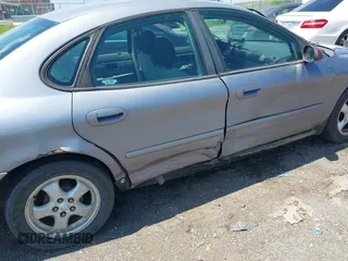 2006 Ford Taurus SE with VIN 1FAFP53U96A192352, listed as a IAAI auction lot 41932885 with Not Provided miles and . Bid and sale history available at DreamBid. Image 12.