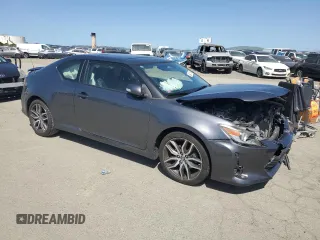 2014 Scion tC with VIN JTKJF5C7XE3085579, listed as a Copart auction lot 52431165 with 44,421 mi miles and Salvage Title. Bid and sale history available at carsss.com. Image 4.