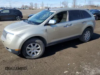 2010 Lincoln MKX z VIN 2LMDJ8JCXABJ33385, wystawiony jako Copart lot #53879355 z przebiegiem 186 066 mil mil oraz Szkoda całkowita • Salvage title. Historia ofert i sprzedaży dostępna na DreamBid. Obrazek 1.