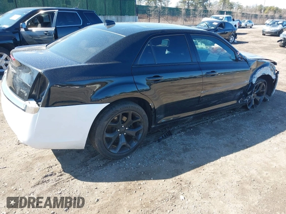 2021 Chrysler 300 with VIN 2C3CCABG8MH606625, listed as a IAAI auction lot 41843582 with 91,685 mi miles. Bid and sale history available at carsss.com. Image 4.