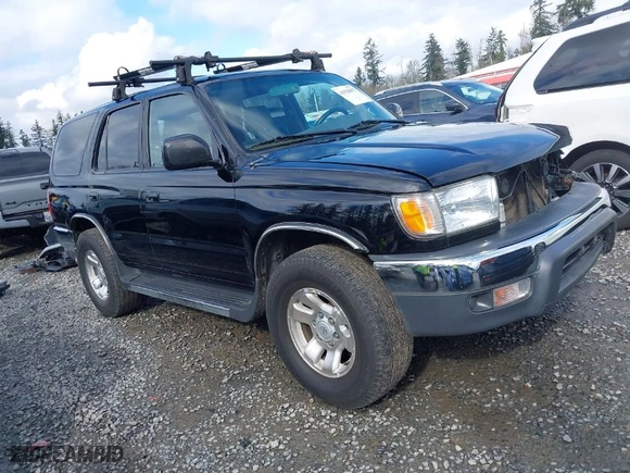 2000 Toyota 4Runner SR5 with VIN JT3HN86R1Y0322493, listed as a IAAI auction lot 41938857 with 121,124 mi miles. Bid and sale history available at carsss.com. Image 1.