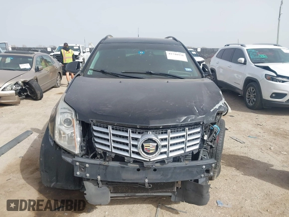 2013 Cadillac SRX z VIN 3GYFNAE3XDS654498, wystawiony jako IAAI lot #41740938 z przebiegiem 134 933 mil mil oraz . Historia ofert i sprzedaży dostępna na DreamBid. Obrazek 12.