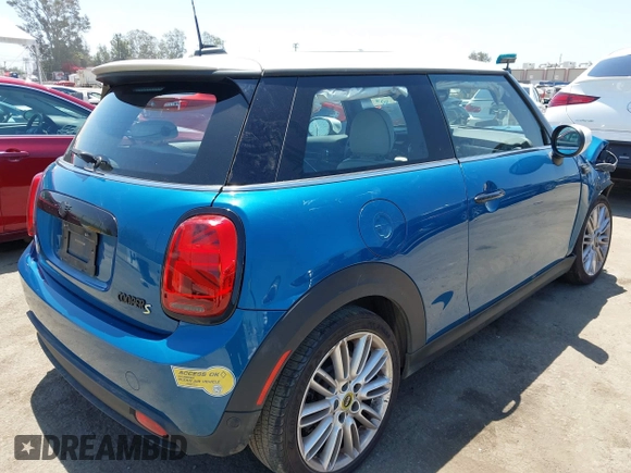 2023 MINI Hardtop Cooper SE with VIN WMW13DJ07P2S73739, listed as a IAAI auction lot 42542088 with 16,344 mi miles and . Bid and sale history available at DreamBid. Image 4.