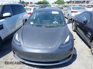 2022 Tesla Model 3 with VIN 5YJ3E1EA0NF344782, listed as a IAAI auction lot 41803469 with 16,973 mi miles and . Bid and sale history available at DreamBid. Image 12.
