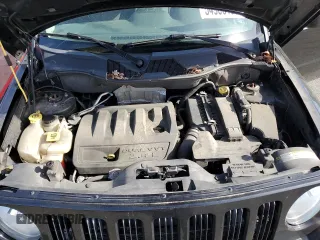 2010 Jeep Patriot Sport with VIN 1J4NF2GB0AD571175, listed as a Copart auction lot 54985195 with 112,365 mi miles and Clean Title. Bid and sale history available at carsss.com. Image 12.