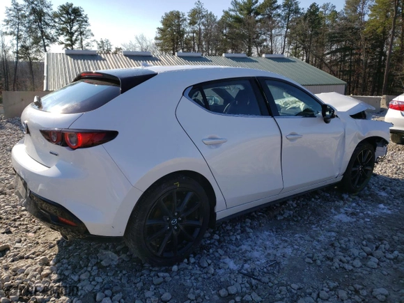 2021 Mazda Mazda3 Hatchback Premium with VIN JM1BPBML5M1315090, listed as a Copart auction lot 67999692 with 11,232 mi miles. Bid and sale history available at carsss.com. Image 3.