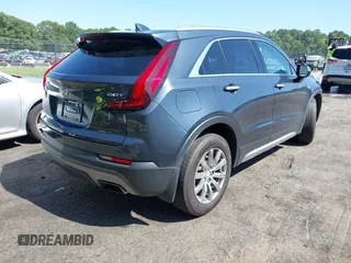 2019 Cadillac XT4 AWD Premium Luxury with VIN 1GYFZDR40KF129461, listed as a IAAI auction lot 42531671 with 60,731 mi miles and . Bid and sale history available at DreamBid. Image 4.