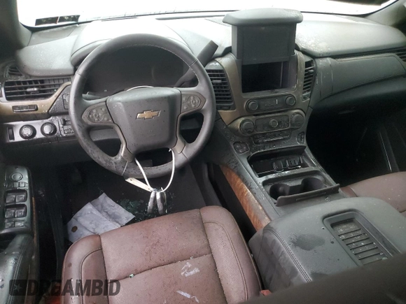 2020 Chevrolet Suburban Premier z VIN 1GNSKJKJ0LR287376, wystawiony jako Copart lot #83407244 z przebiegiem Nie podano mil oraz Szkoda całkowita • Salvage title. Historia ofert i sprzedaży dostępna na DreamBid. Obrazek 8.