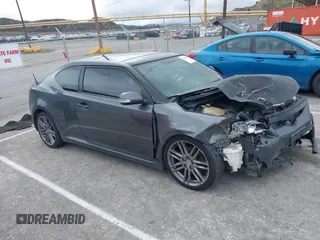 2013 Scion tC with VIN JTKJF5C74D3052964, listed as a IAAI auction lot 41804627 with 244,013 mi miles. Bid and sale history available at carsss.com. Image 1.