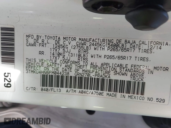 2015 Toyota Tacoma PreRunner with VIN 3TMKU4HN6FM044238, listed as a IAAI auction lot 41534623 with 196,490 mi miles and . Bid and sale history available at DreamBid. Image 9.
