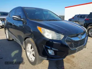 2013 Hyundai Tucson GLS with VIN KM8JU3AC4DU616121, listed as a IAAI auction lot 41284719 with 154,406 mi miles. Bid and sale history available at carsss.com. Image 1.