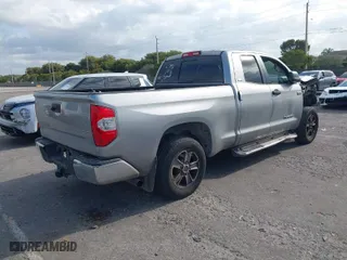 2015 Toyota Tundra 2WD Truck SR5 with VIN 5TFRY5F15FX177849, listed as a IAAI auction lot 41912719 with 233,567 mi miles. Bid and sale history available at carsss.com. Image 4.