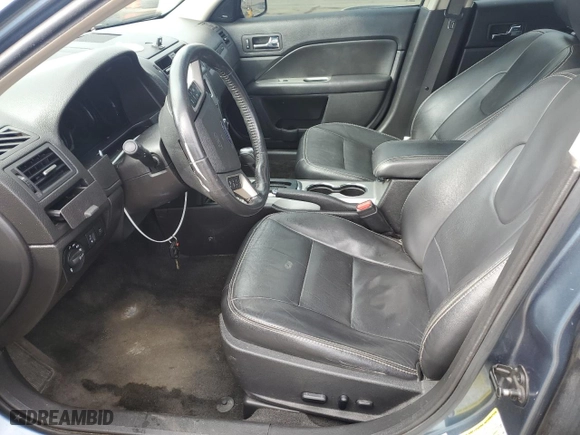 2012 Ford Fusion SEL with VIN 3FAHP0JA9CR387843, listed as a Copart auction lot 50741115 with 217,771 mi miles and Salvage Title. Bid and sale history available at carsss.com. Image 7.