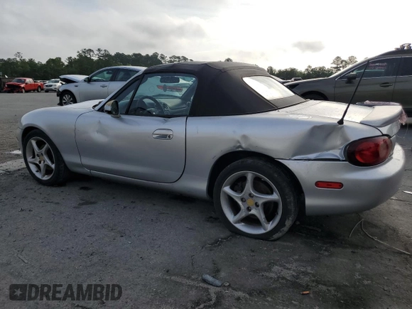 2003 Mazda MX-5 Miata Cloth z VIN JM1NB353630305964, wystawiony jako Copart lot #58517505 z przebiegiem 129 675 mil mil oraz Szkoda całkowita • Salvage title. Historia ofert i sprzedaży dostępna na DreamBid. Obrazek 2.
