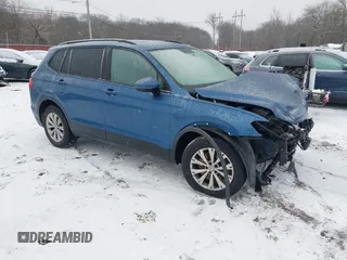 2018 Volkswagen Tiguan S with VIN 3VV0B7AX8JM081263, listed as a IAAI auction lot 41245308 with 58,778 mi miles and . Bid and sale history available at DreamBid. Image 1.