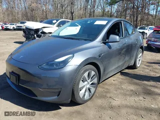 2023 Tesla Model Y Long Range with VIN 7SAYGDEEXPA175104, listed as a IAAI auction lot 41821928 with 52,791 mi miles. Bid and sale history available at carsss.com. Image 20.